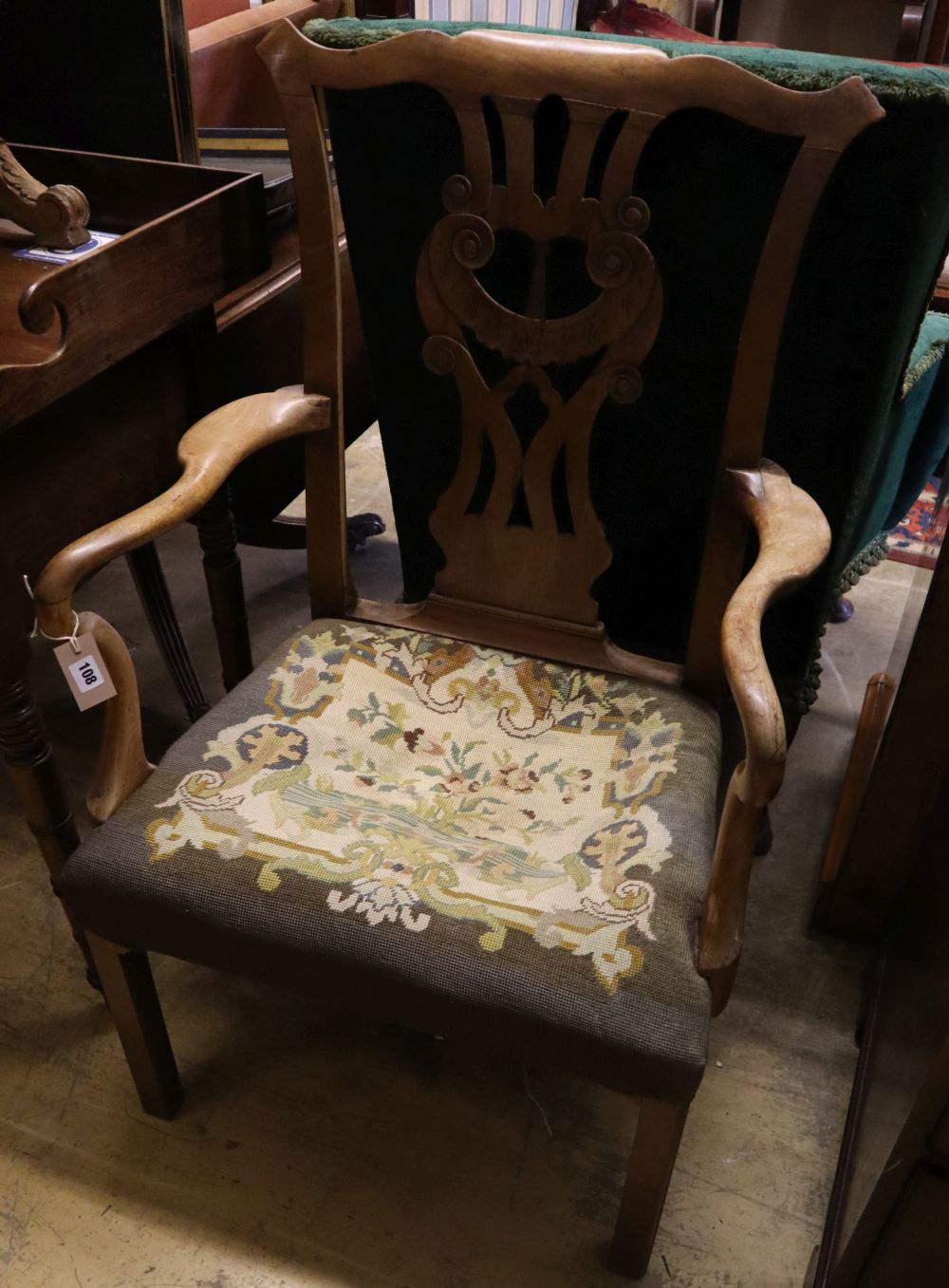 A George III mahogany armchair with shepherds crook arms